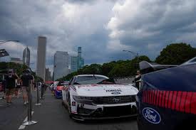 At the NASCAR Chicago Street Race, Bowman overcomes the rain to win